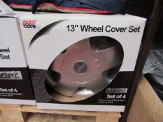 Set of 4 13" Auto Care Wheel Covers. Boxed