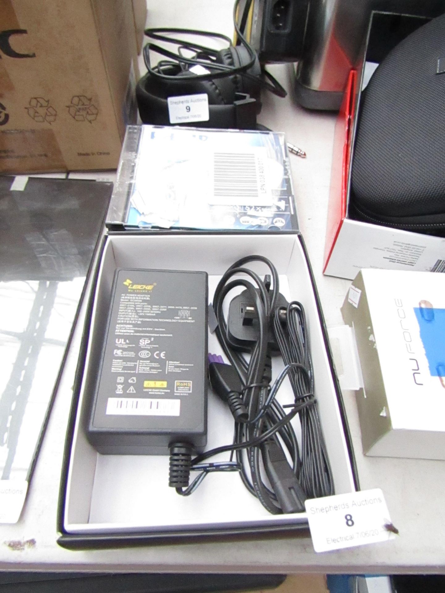 Leicke AC power adaptor with 10x Philips CD-R discs, untested and boxed.