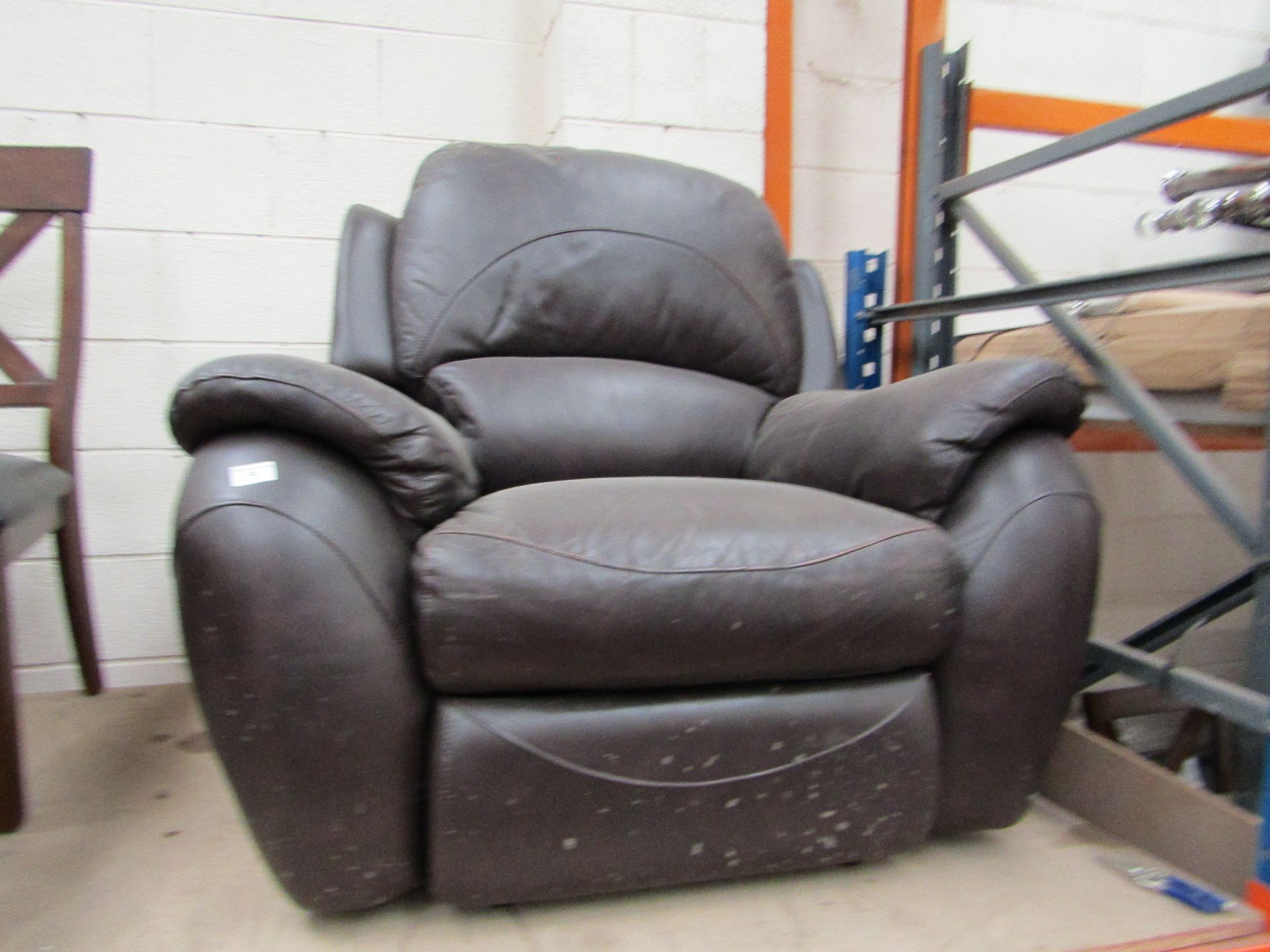 La Z Boy leather manual recling arm chair, the mechainsm is working, there are spots of wear showing