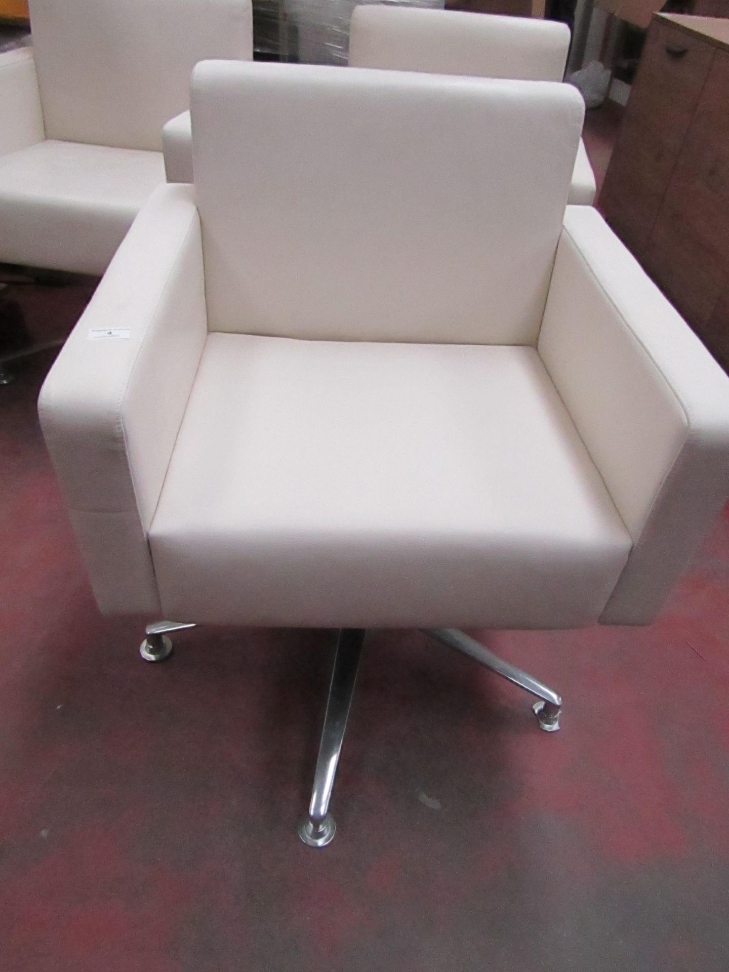 Boss commercial cream show room swivel chair, this item was originally intended for a BMW show room,