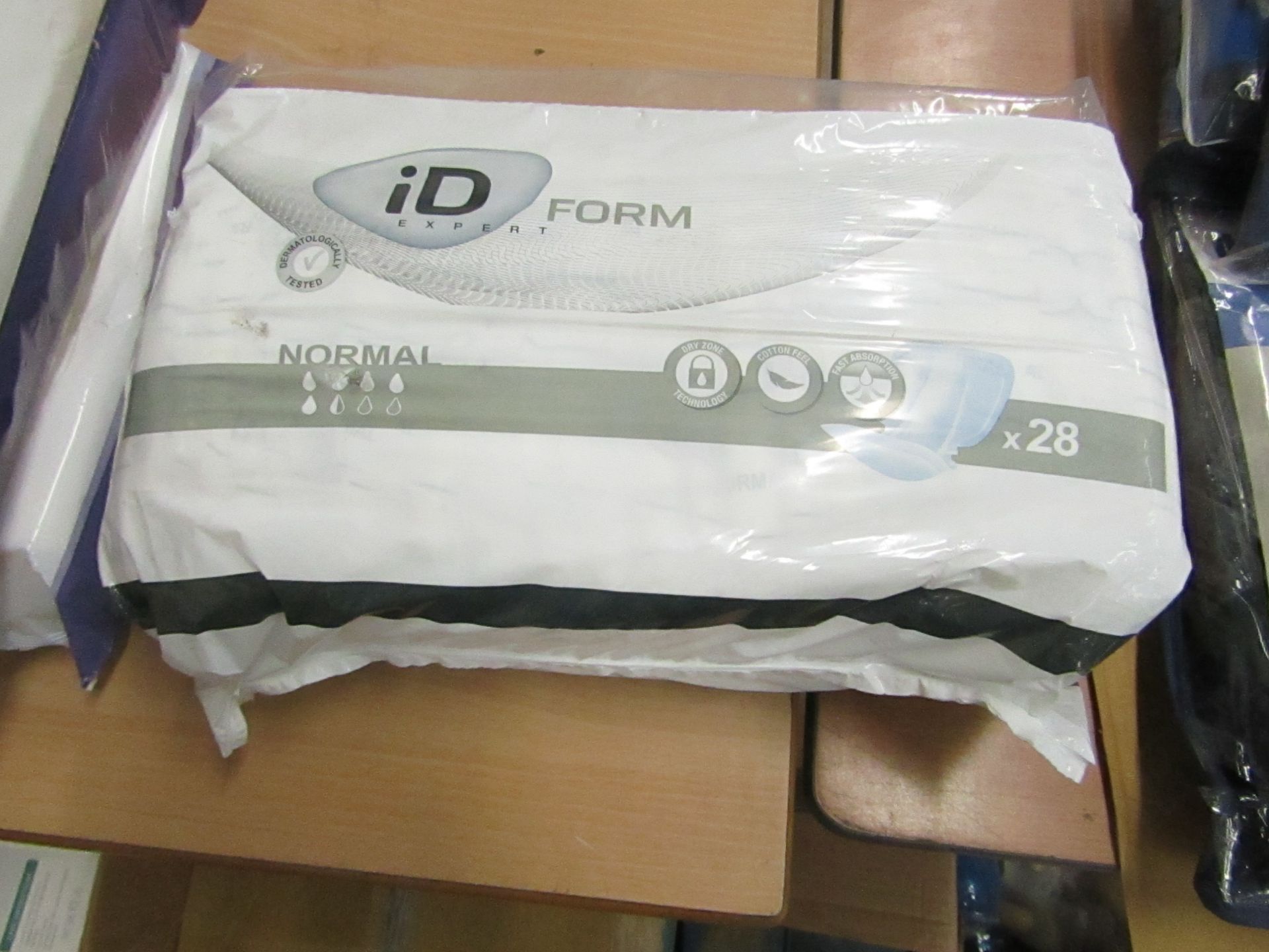 pack of 28x iD Expert Form Anotomically shaped adult Pads, still sealed