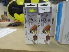 2x Poppet Pill Popper and Pourer, look unused and boxed