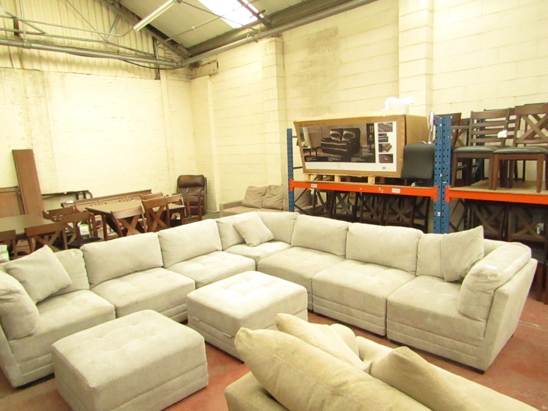 M Star Mega Sofa set, this set is made up of 9 sectional pieces 2 of which are foot stools and can