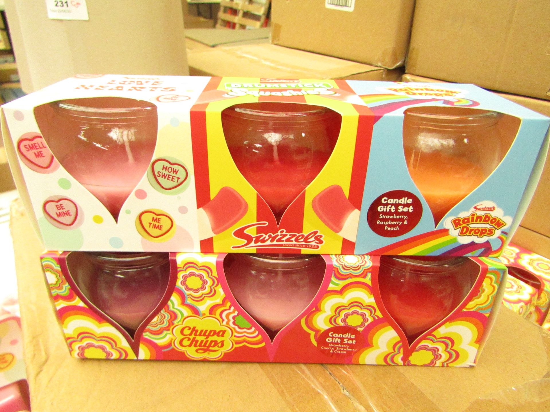 2 Packs of 3 Swizzles Candles. Love hearts, Drumstick Squashies & Rainbow Drops. New & Packaged