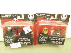 2 x The Nightmare Before Christmas Figure packs. See Image