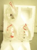 2 packs of 4 Christmas Ornaments. New & Boxed