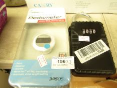 2 Items Being a Coded Key Safe & a Calorie Tracking Pedometer. Both look unused