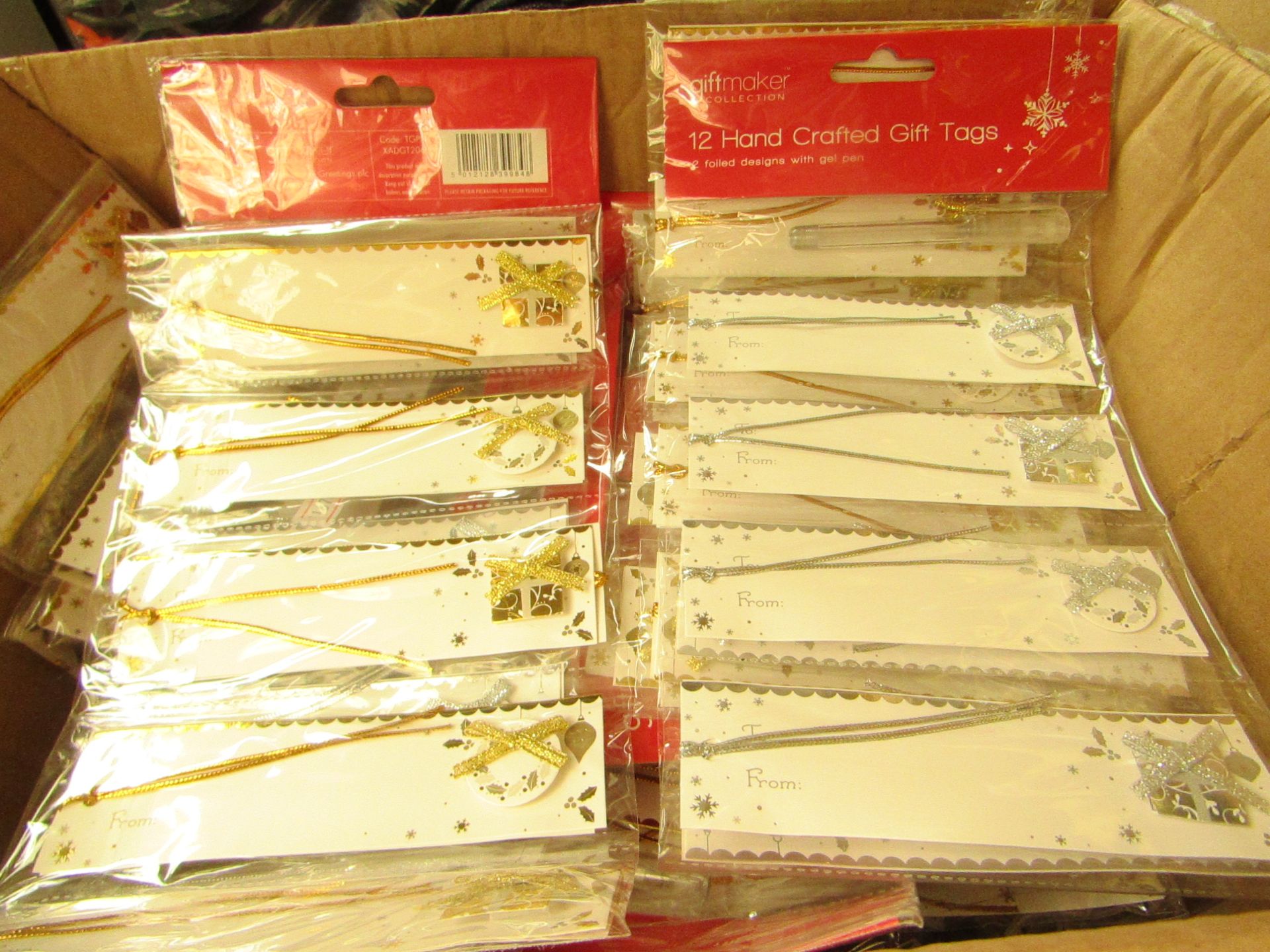 Approx 42 Packs of 12 Hand Crafted Gift Tags with gel Pens. New & Packaged