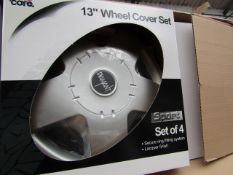 Set of 4 Auto Care 13" wheel trims, new and boxed