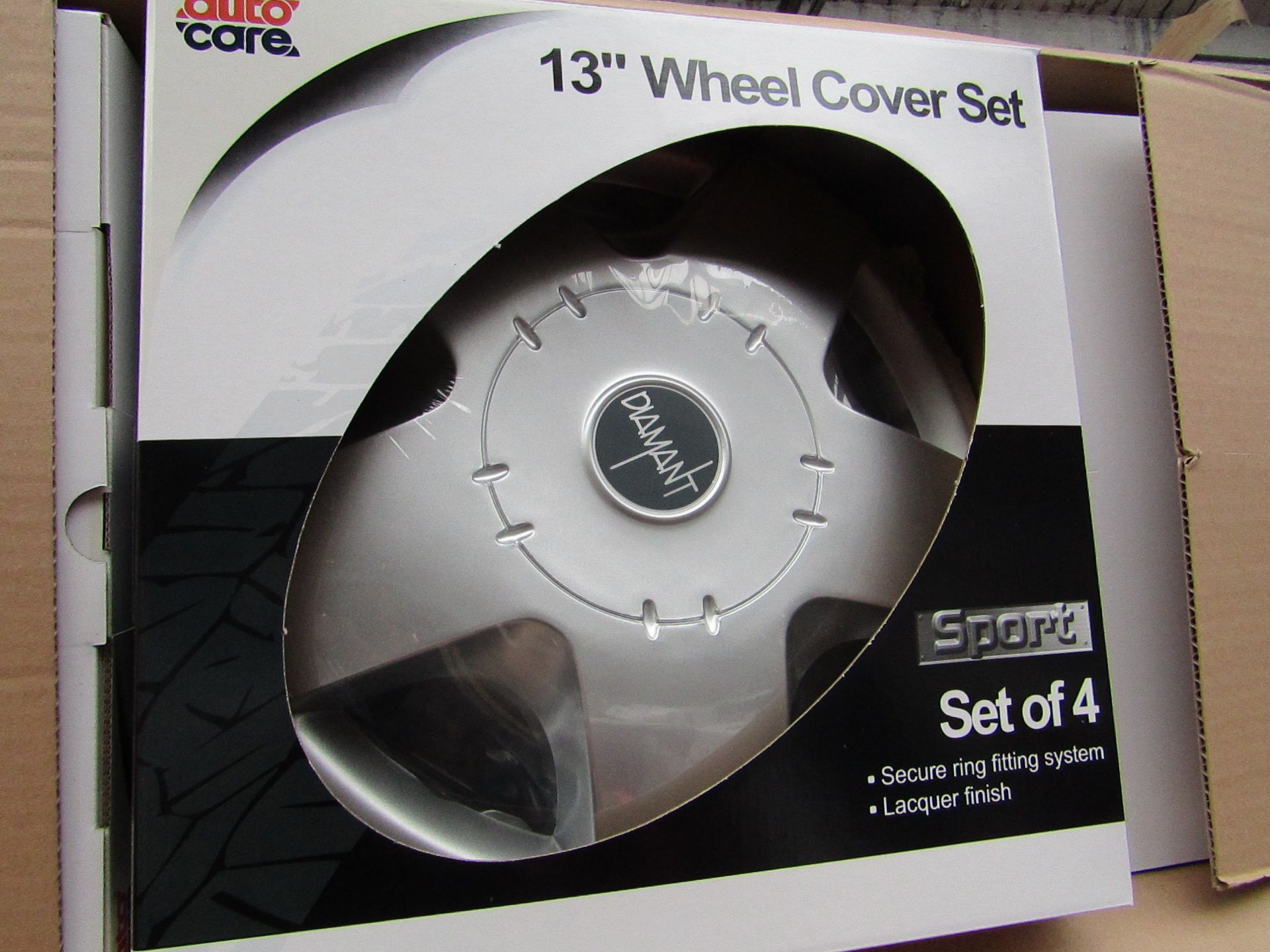 Set of 4 Auto Care 13" wheel trims, new and boxed