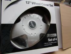 Set of 4 Auto Care 13" wheel trims, new and boxed