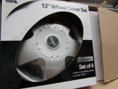 Set of 4 Auto Care 13" wheel trims, new and boxed