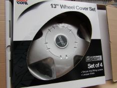 Set of 4 Auto Care 13" wheel trims, new and boxed