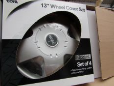 Set of 4 Auto Care 13" wheel trims, new and boxed