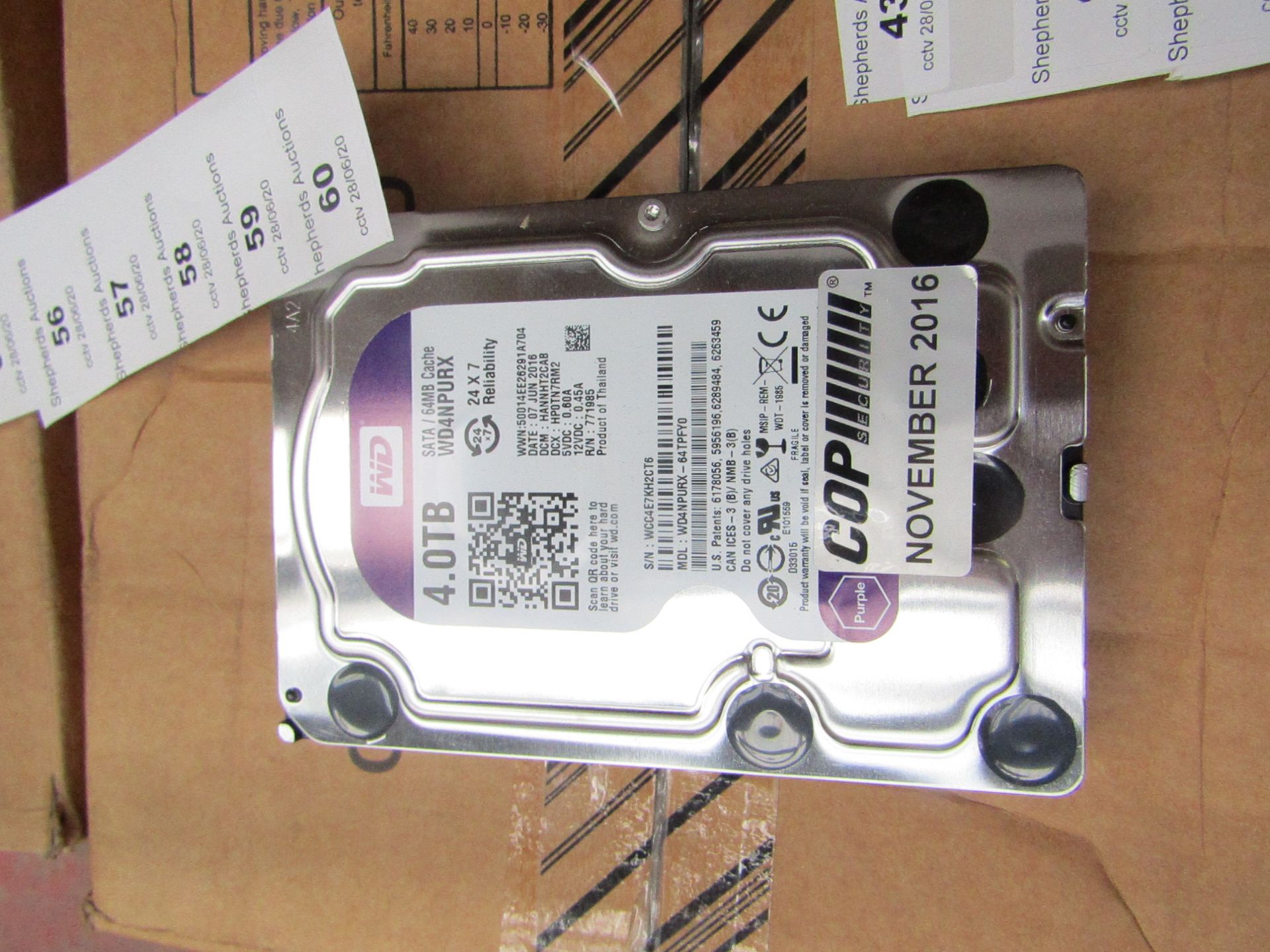 Western Digital 4TB hard drive, tested working.