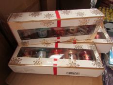 4x Packs of 4Festive Votive candles, new.