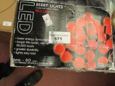 Berry red lights, LED, unchecked and boxed.