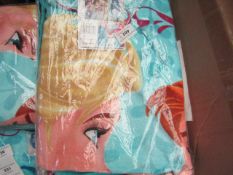 Disney Frozen printed beach towel, new and packaged.