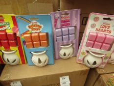 16x Various Swizzels scented wax burners, 4x Drumstick Squashies, 4x Parma Violets, 4x Rainbow Drops