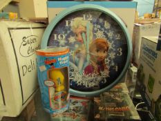 2 items being 1 x Frozen battery Operated Wall Clock & 1 x The Happys Dog Treat Toy packaged