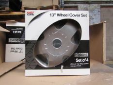 Set of 4 Auto Care 13" wheel trims, new and boxed