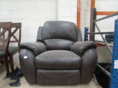 La Z Boy leather manual recling arm chair, the mechainsm is working, there are spots of wear showing