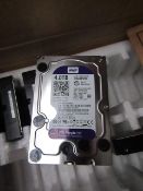 Western Digital 4TB hard drive, vendor suggests tested working and we HAVE NOT checked if wires or