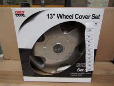 Set of 4 Auto Care 13" wheel trims, new and boxed