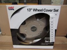 Set of 4 Auto Care 13" wheel trims, new and boxed