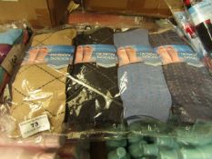 12 Pairs of Ladies Design Socks. Size 4 - 7. New & packaged