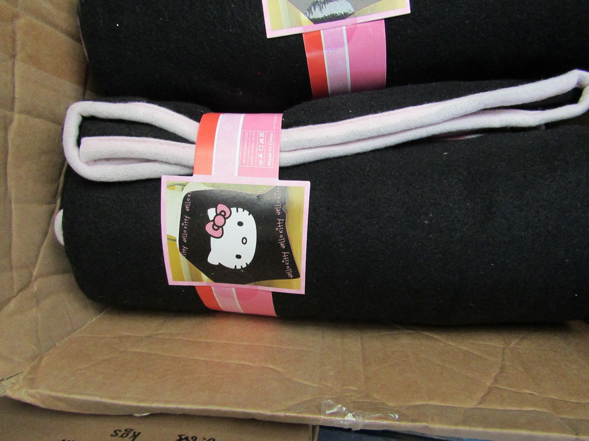 Hello Kitty fleece blanket, new and packaged.