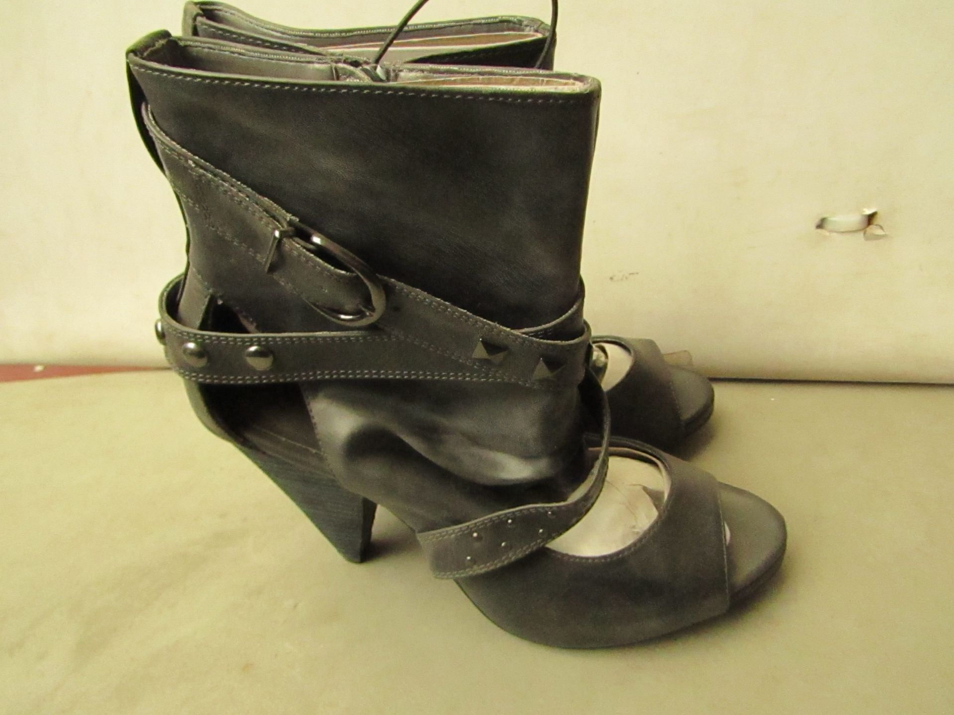 Pair of Size 8 Buckle Boots. Unworn