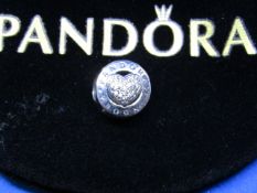 Pandora Charm in branded felt bag, new, please see picture for style.