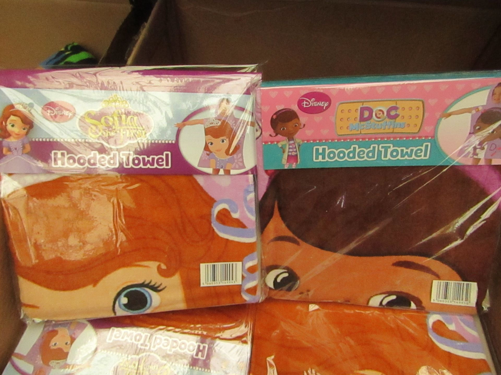 2 x Hooded Towels. 1 Being Sofia The First & The Other Doc McStiffins. Both New & Packaged