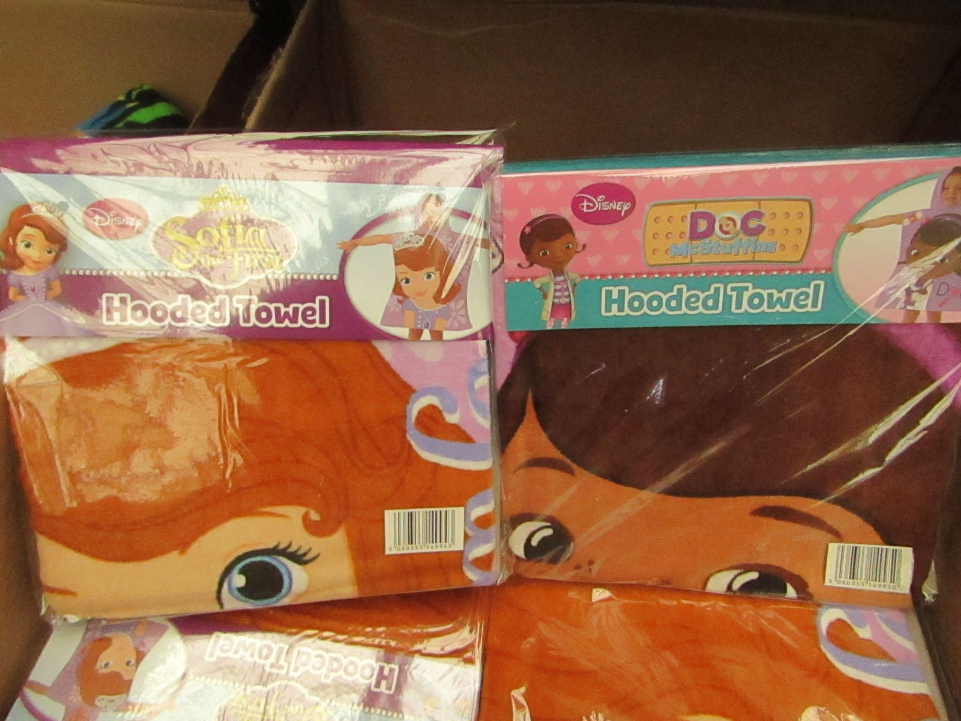 2 x Hooded Towels. 1 Being Sofia The First & The Other Doc McStiffins. Both New & Packaged