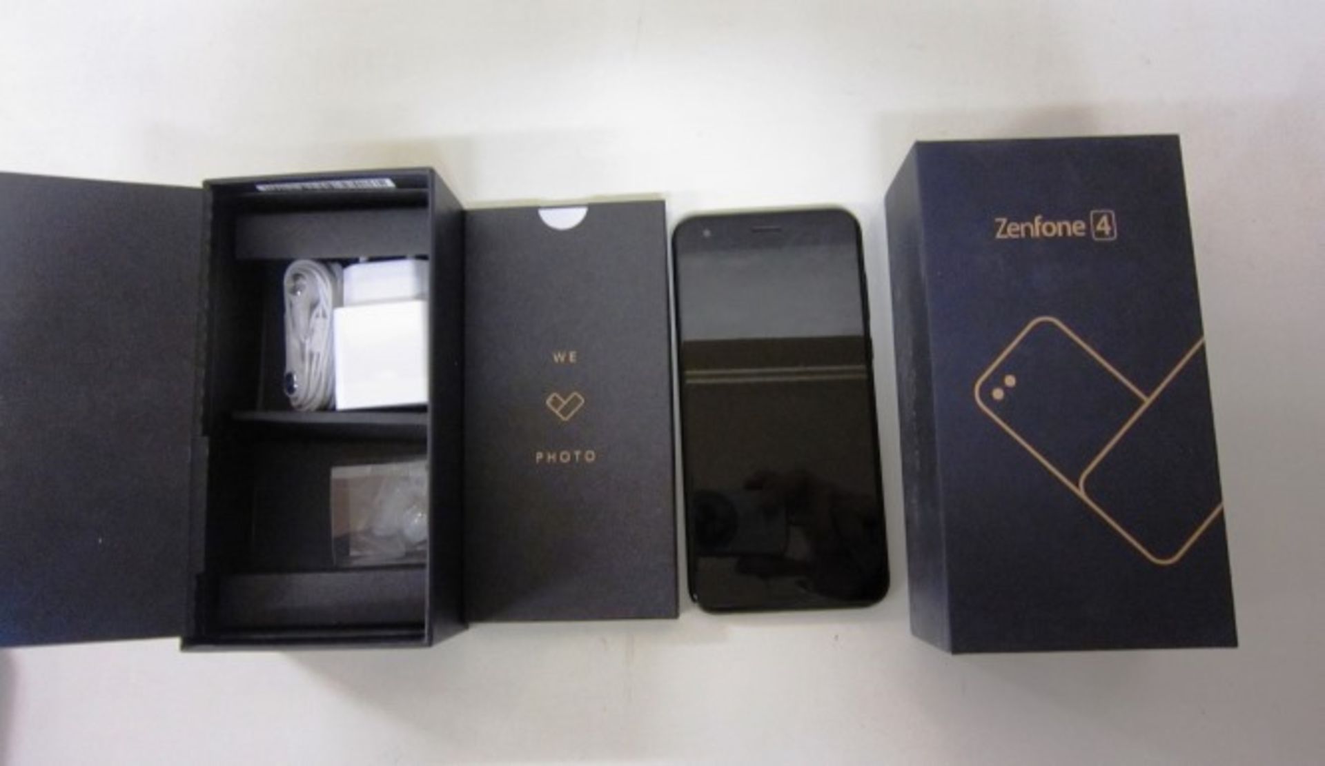 ASUS Zenphone 4 in black 64GB comes with protective case, earphones and european charger. Tested - Image 2 of 2