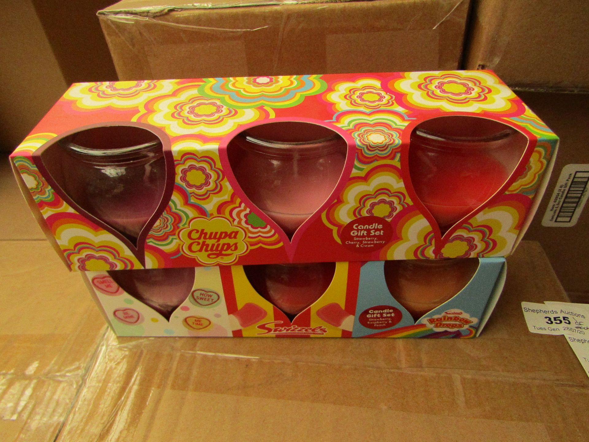 2 Packs of 3 Candles. 3 Being Swizzles & 3 Being Chupa Chups. New & Packaged