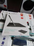 Logitech ultra thin keyboard folio for iPad Air, untested and boxed. QWERTY keyboard