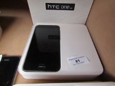 HTC One (M8) CDMA phone, no power. Boxed. Estimated specs at https://www.gsmarena.com/htc_one_(m8)