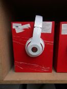 Beats Studio wired over-ear headphones, tested working but ear pads may need replacing. See