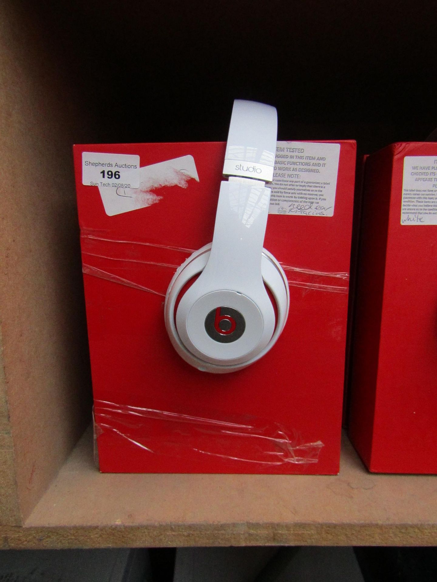 Beats Studio wired over-ear headphones, tested working but ear pads may need replacing. See