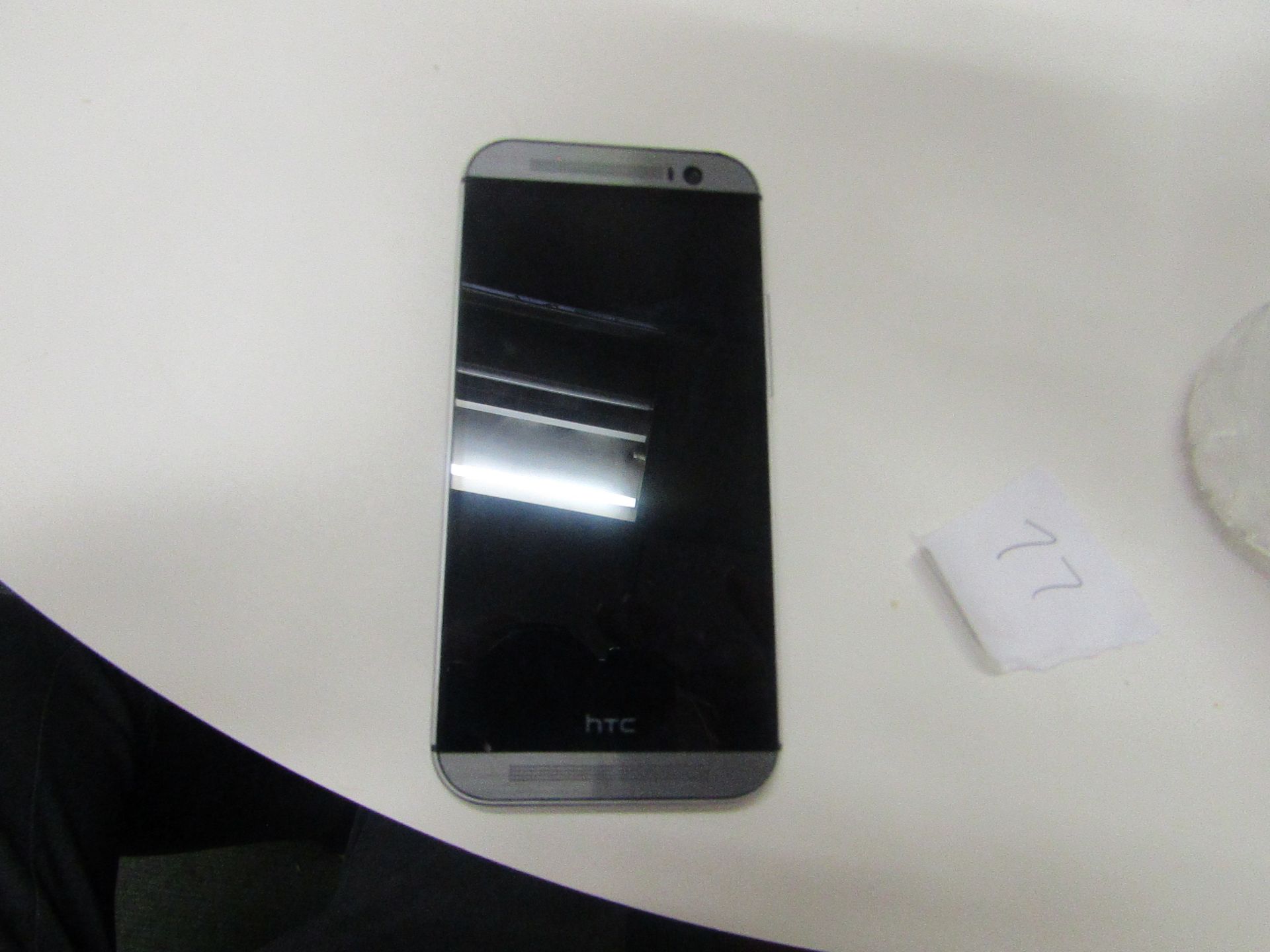 HTC One (M8) CDMA phone, powers on but not tested full functions. Boxed. Estimated specs at