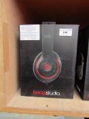 Beats Studio wired over-ear headphones, tested working but ear pads may need replacing and boxed.