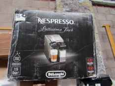 Nespresso Latissimi Touch Coffee Machine, looks unused but has a euro plug so we can not tested full