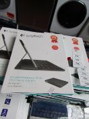 Logitech ultra thin keyboard folio for iPad Air, untested and boxed. QWERTY keyboard