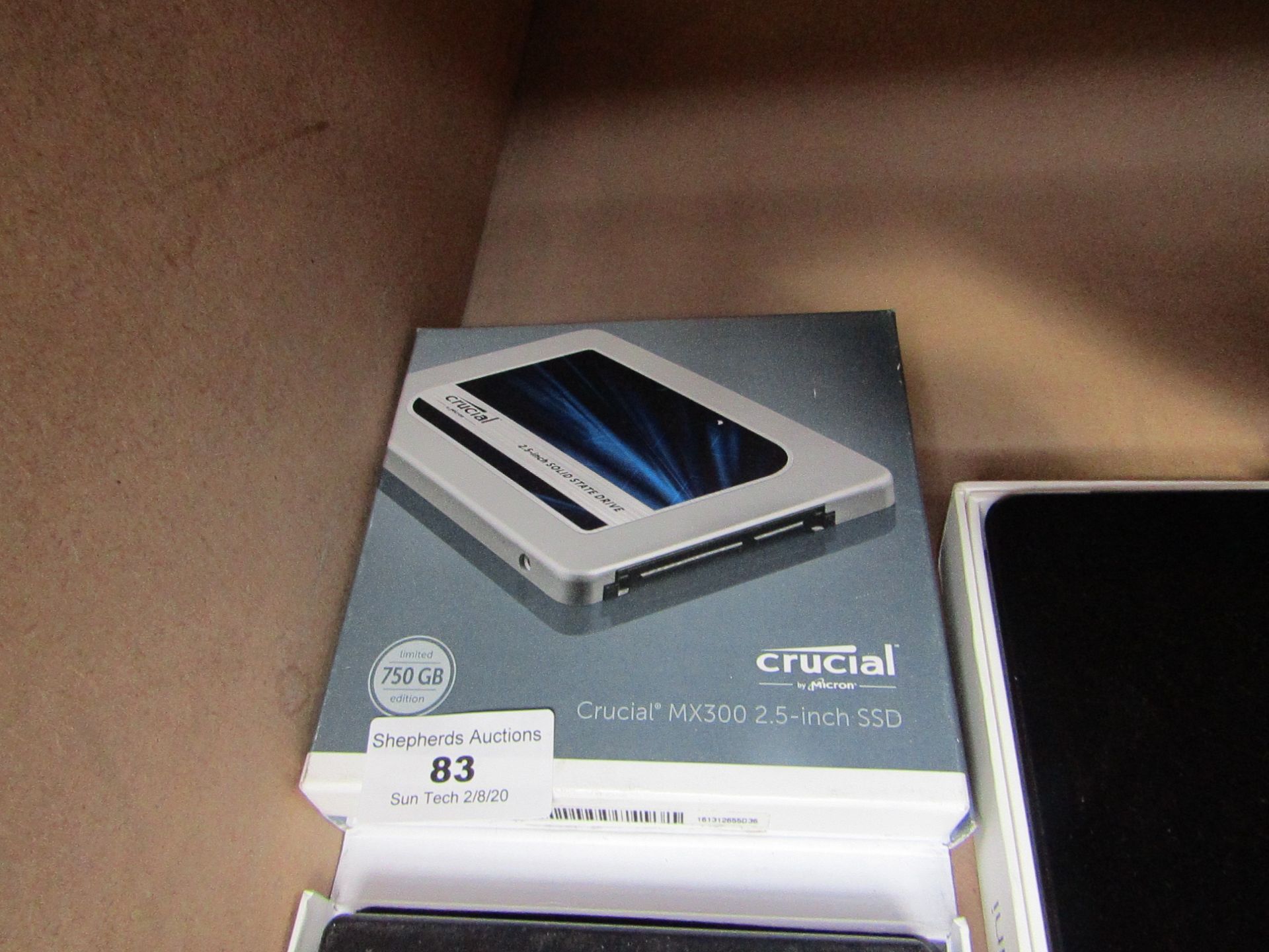 Crucial 2.5" solid state drive, untested and boxed.