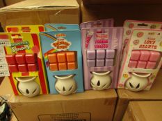 16 x Swizzles Wax Melt Burners with melts. 4 x Drumstick Squashies, 4 x Rainbow Drops, 4 x Parma