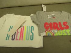 2 Kids Tops. 1 Age 5 & 1 Age 7/ Both new with Tags