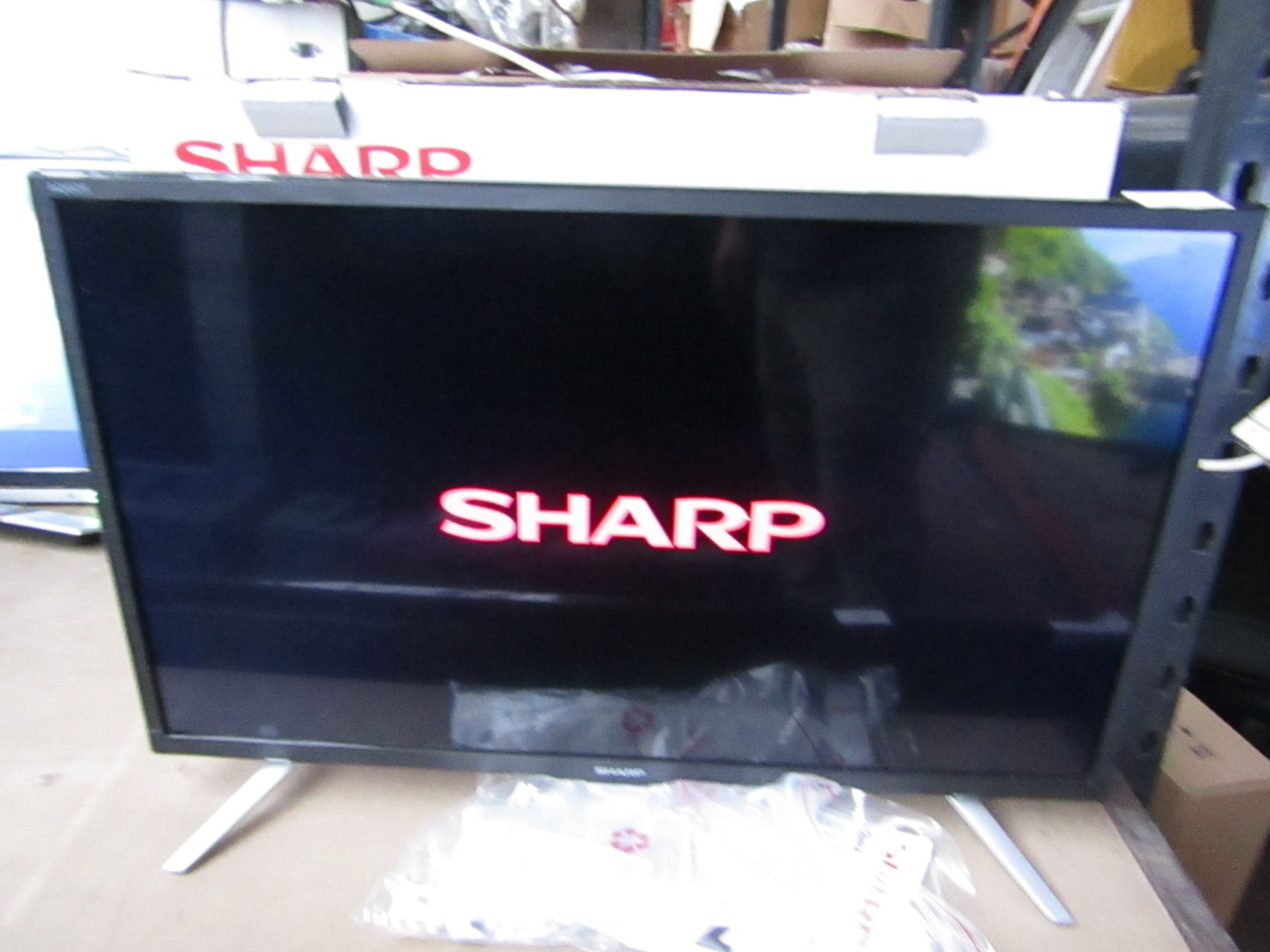 Sharp Aquos LC-24DHG6131KF 24" smart Led TV with Built in DVD player, the TV part is Tested we