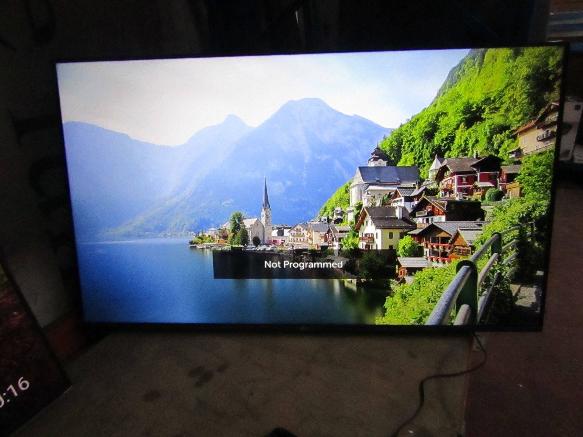 LG55UM7660 Smart 4K LED TV, tested working with Magic remote control, Missing stand and box, has a
